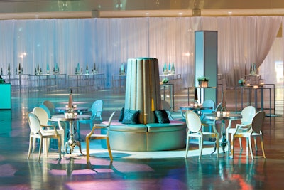 Roni Feldman & Associates Inc. used tables surrounded by Philippe Starck's Louis Ghost chairs to create lounge areas for guests.