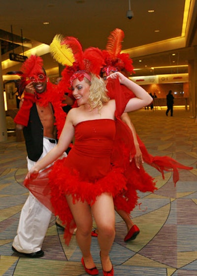 Dancers in red costumes added to the fiery theme.
