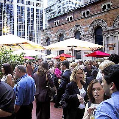 Guests mingled in the perfect summer weather on Cafe St. Bart's outside patio.