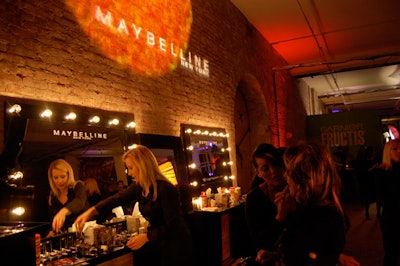 Sponsor Maybelline's setup included mirrors and chairs where makeup artists applied eye shadow and liner to guests.