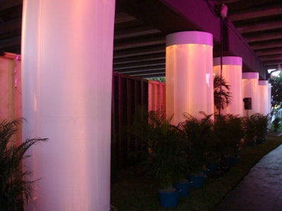 The Design Group of Miami used sheer draping and colorful lighting to cover the bridge's support beams.