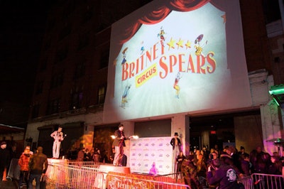 Projections of circus video and imagery designed by Dorian Orange played above the entrance throughout the night.