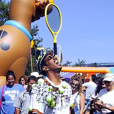 A juggler from Always Entertaining performed for kids at Arthur Ashe Kids' Day on the grounds of the USTA National Tennis Center in Flushing, Queens.