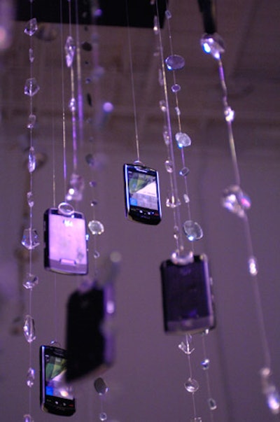 43degrees created custom chandeliers with strands of mirrored discs and the new Blackberry Storm devices.