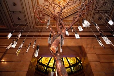 The check-in table featured a centerpiece of manzanita branches, which held personalized luggage tags for each guest.