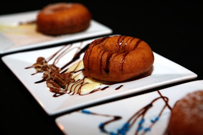 The dessert reception featured a doughnut-making machine, chosen for the sweet smell it created in the room.