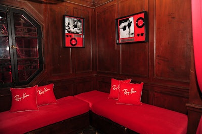 The V.I.P lounge upstairs had red banquettes and pillows for guests who wanted to keep their distance from the fray on the main floor.