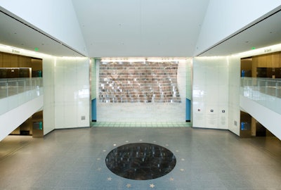 As guests enter the National Museum of American History's Star Spangled Banner Gallery from the Mall, they're find the Abstract Flag, which is comprised of thousands of reflective mirrors.