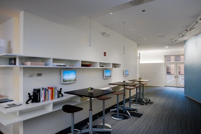 The Forum features books, videos, and French doors that look out onto the courtyard.