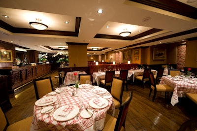 The Jockey Club, with red and beige decor, has new windows for more natural light.
