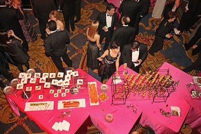 Bright pink linens were meant to bring a warm-weather vibe to the cocktail reception.