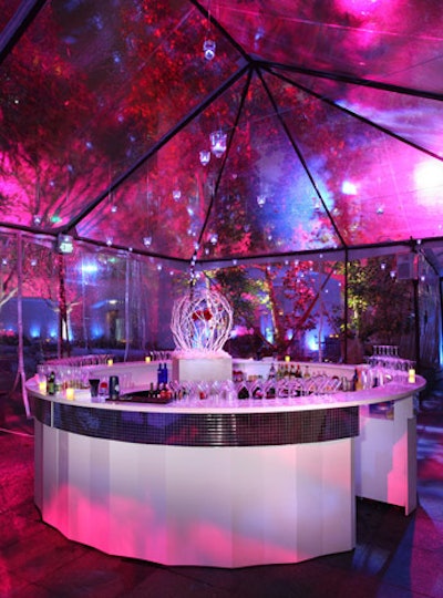 A clear-topped tent in the courtyard housed a circular bar.