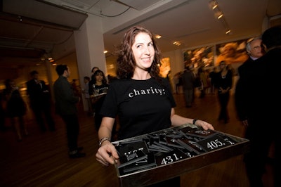 Guests received numbered puzzle pieces to put on a giant display that became a portrait of one of Charity: Water's many beneficiaries.