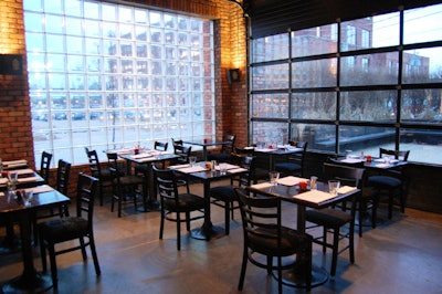 The back room—which can be configured for private meetings and dinners—opens onto a patio that can hold as many as 80 people.