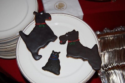 Pastry chefs produced a chocolate-covered Kitty cookie to accompany the two White House dog cookies representing Barney and Mrs. Beasley.