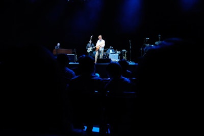 Steve Winwood performed after dinner; his song 'You Never Know What the Night Can Do' inspired the gala's theme.