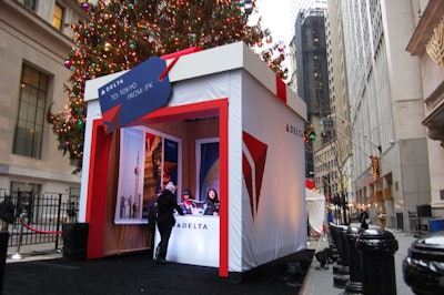 Delta customer service representatives from J.F.K. passed out green tea and fortune cookies in the booth, highlighting the airline's Asian destinations.