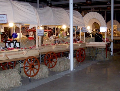 Planners for the American Cancer Society's annual Cowford Ball in Jacksonville created a novel setup for its silent-auction items by placing them in a series of covered wagons, to tie into the event's western theme.