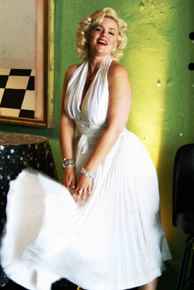 A Marilyn Monroe look-alike glamorously stepped out of a white limousine, entered the theater past mock paparazzi stationed outside, and sneaked out the back repeatedly throughout the Ritz Ybor's 1920s-themed reopening party.