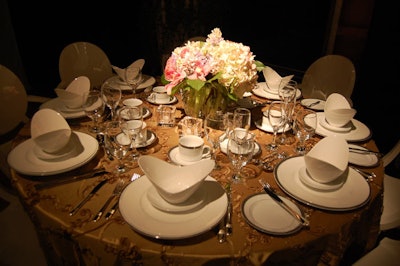 The Carlu created a variety of table settings at a display showcasing items from Exclusive Affair Rentals, Signature Party Rentals, San Remo Florist, and Westbury National Show Systems.