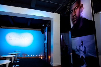 In the front area, images tied into the marketing and curvy white furniture echoed the shape and shade of the sneaker.