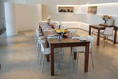 A semiprivate dining area, equipped with a drop down screen for presentations, can accommodate groups of up to 30 people.