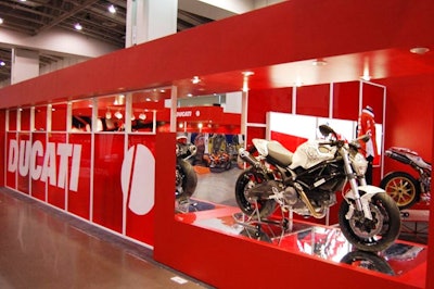 Ducati's European-style enclosed exhibit was eye-catching in flame red and offered clients privacy.