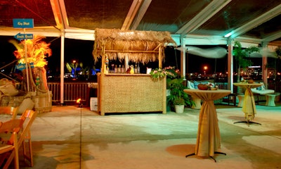 More laid-back, the Key West space boasted tiki-hut bars, wicker cabanas, and coconut centerpieces.