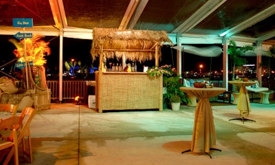 More laid-back, the Key West space boasted tiki-hut bars, wicker cabanas, and coconut centerpieces.