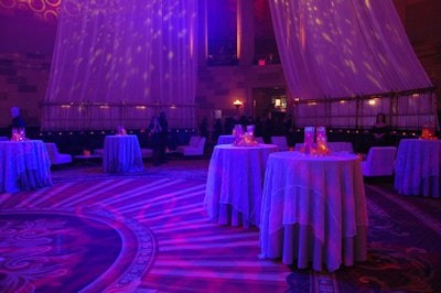 The floor was covered with tables for cocktails and plates form the buffet, but seating was strictly reserved for the V.I.P. crowd, including Tyra Banks.