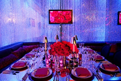 Bright red roses topped tables.