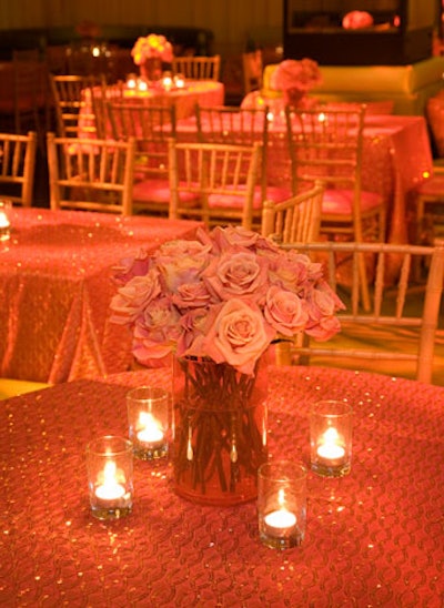 Bunches of roses topped tables.