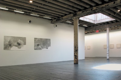 Much like the venues in this area of Midtown, the Hosfelt Gallery features architectural elements from its history as a warehouse, including structural columns and wooden flooring.