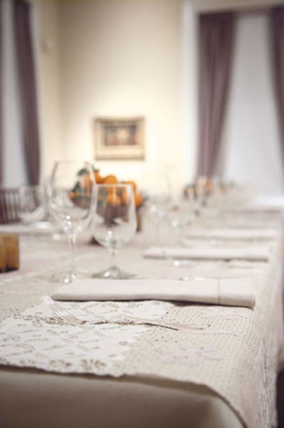 Hand-stitched table linens made with recycled fabrics were the key decor element.