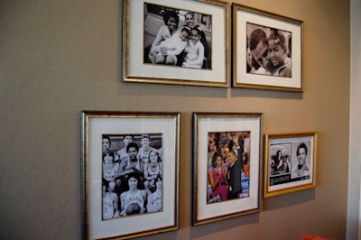 In the library area, a wall of photos depicts moments from Obama's life.