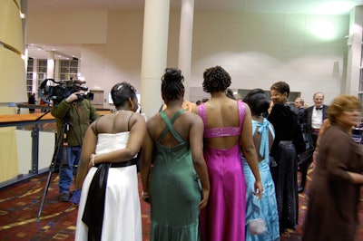Guests at the Chicago Inaugural Ball took the formal dress code to heart, arriving in tuxes and colorful gowns.