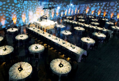 For the gala opening of the Chado Ralph Rucci exhibit at the Phoenix Museum of Art in March, Kinetic Lighting incorporated elements of the tabletops into decorative wall illuminations. Soft-edged circles and ovals emulated river rock from centerpieces, in shades of blue to give the effect of water.