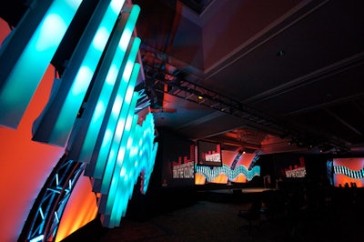 For Quintiles Transnational Corporation's global leadership meeting in Hawaii last January, New York-based Barkley Kalpak Associates created installations of Versa Tubes to illustrate the event's 'Turn Up the Volume' theme. The tubes changed colors as music played to give the impression that the room was engulfed in a sound wave.