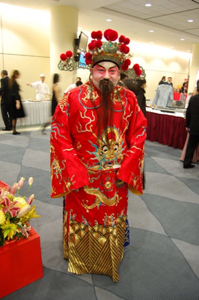 Volunteers dressed as Chinese gods of fortune mingled with guests during the cocktail reception.