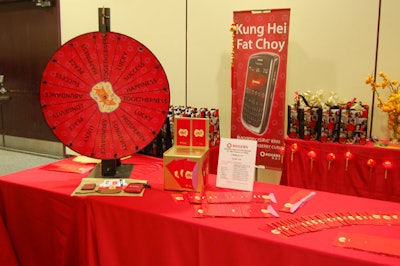 Guests had the chance to view new cell phones and spin a wheel of fortune to win a prize at a display sponsored by Rogers.