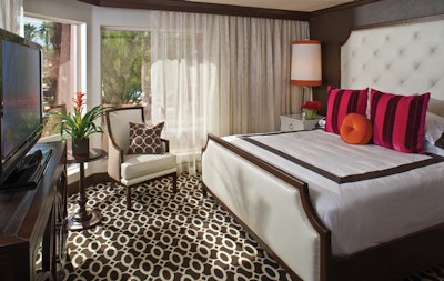 Guest rooms at the Riviera Resort & Spa feature splashes of bright color.