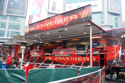 Servers inside the Budweiser Big Rig sold beer and offered onlookers free lunches from the Pickle Barrel.