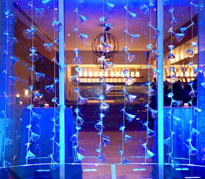 E Squared Concept's signature martini-glass walls adorned the floor-to-ceiling glass windows.
