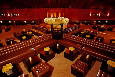 Tufted leather seating clusters dotted People's SAG Awards after-party space.