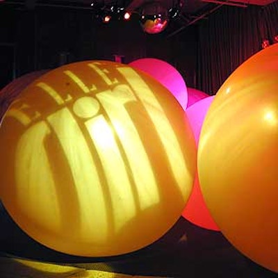 At the launch party for Elle Girl magazine at the Roxy, Avi Adler brought in giant weather balloons as decor pieces to add some dimension to the giant club space. Custom Lighting lit the balloons with candy-colored lights and gobos.