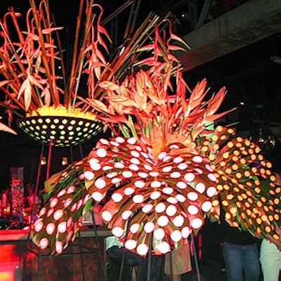 Avi Adler brought in brightly colored heliconia and giant dendrobium leaves polka-dotted with Elle Girl stickers to decorate the bar area.