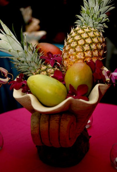 Tropical fruits were used in centerpieces to continue the island theme throughout the space.