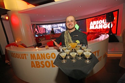 Servers wore gold scarves and circulated with Absolut Mango martinis.