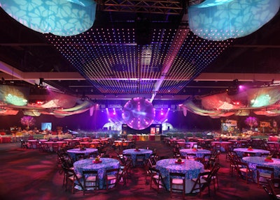 A programmable LED panel suspended above the room at the Recording Academy's 'Grammy Celebration' showed rotating images including an American flag.