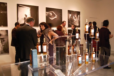 Guests viewed Rankin's photos for the Macallan at M&B Gallery.